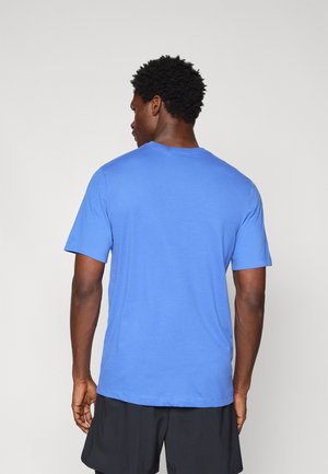 TEE TRAINING - Sports T-shirt - comet blue