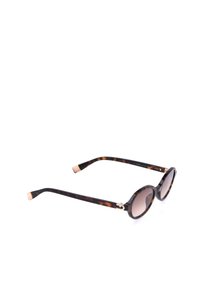 Lunettes de soleil rondes avec montures écaille de tortue marron et verres marron dégradés sur fond blanc.