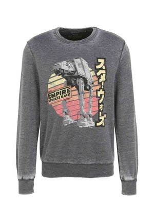 Sudadera gris con un gráfico de un caminante AT-AT y texto de estilo retro en amarillo, rosa y negro. Puños y cuello acanalados.