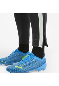 Puma Trainingsbroek - black