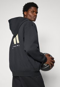 adidas Performance HOODY - Sudadera con cremallera - black
