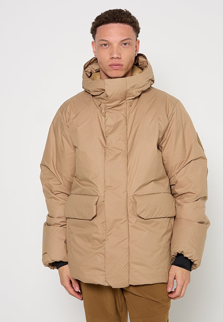 Under Armour Gewatteerde jas lichtbruin Under Armour Gewatteerde jas lichtbruin