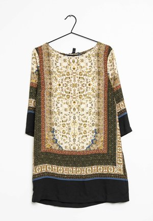 Mønstrede tunikaer med rund halsudskæring. Har komplekse design i guld, blå og sort. Trekvartærmer, sort nederste kant.