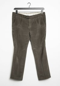 Brown corduroy trousers with belt loops, front button, and side pockets hanging on black hanger against white background.