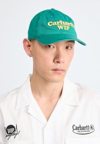 SCRIPT UNISEX - Cap - rainforest/air yellow