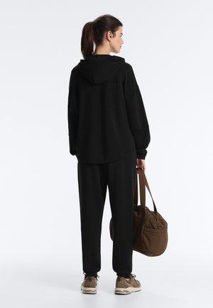 OYSHO SOFT TOUCH JOGGER - Jogginghose - black