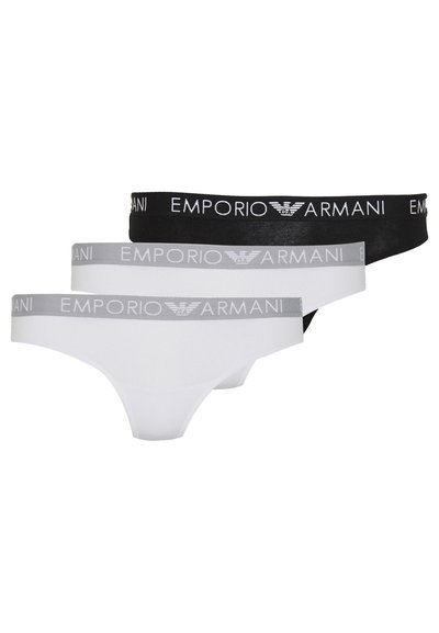 Trīs pāri Emporio Armani čību baltā, pelēkā un melnā krāsā. Katram ir kontrastējošs elastīgs jostasvīrs ar zīmola vārda logo.