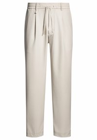 Beige, ontspannen fit broek met een elastische tailleband en trekkoord. Kenmerkt zich door plooien aan de voorkant en een taps toelopend ontwerp. Glad textuur.