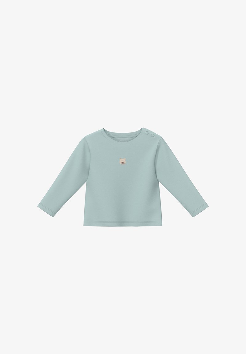 Mintgrünes Langarmshirt aus weichem Stoff. Mit einem runden Ausschnitt und zwei Knopfakzenten an der Schulter, versehen mit einem Bären-Graphic-Detail.