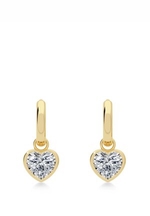 Goldene Herz-ohrringe mit klaren Edelsteinen, mit einer polierten Oberfläche und glatten, abgerundeten Beschlägen. Jeder Ohrring hängt an einem einfachen Ring.