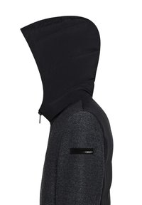 Giacca a vento nera con cappuccio, caratterizzata da un corpo in un mix di lana grigia strutturata e una patch con logo sulla parte superiore del braccio. Chiusura con zip.