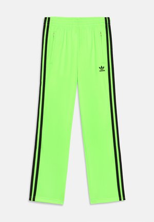 FIREBIRD UNISEX - Tracksuit bottoms - signal green