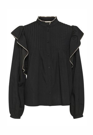 Fekete blúz magas gallérral, függőleges redőkkel és fodros ujjal. Díszítő passzpólóval a fodrok mentén és elülső gombokkal rendelkezik.