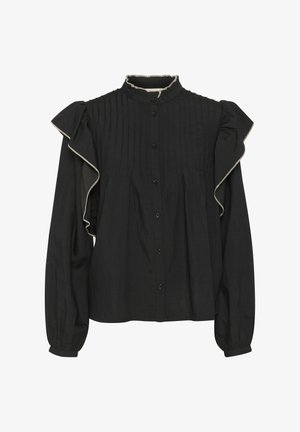 Fekete blúz magas gallérral, függőleges redőkkel és fodros ujjal. Díszítő passzpólóval a fodrok mentén és elülső gombokkal rendelkezik.