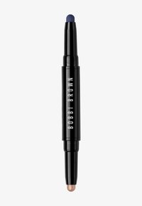 Dobbeltkappet blyant i svart emballasje. Den ene enden har en blå spiss, mens den andre har en metallisk bronsefarge spiss. Glatt, sylinderformet design.