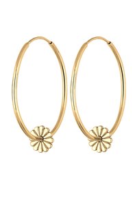 Goldene Ohrhänger mit einer Blumenakzent am Boden, die eine glatte, polierte Oberfläche und ein zirkuläres Design aufweisen.