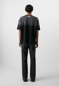 Don't Waste Culture JEFF UNISEX - Straight leg jeans - black