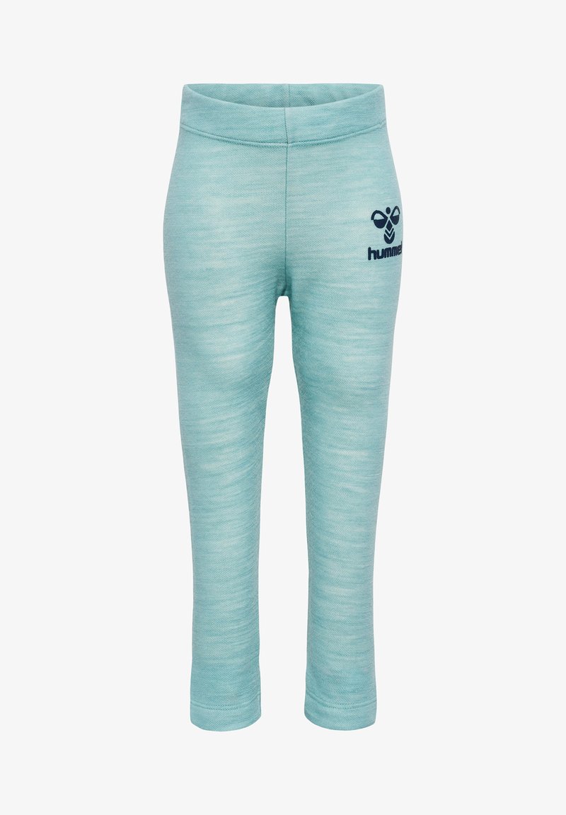 Ljusblå leggings i strukturerad tyg med elastisk midja. Har en liten marinblå logotyp på vänster sida.