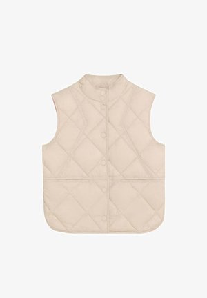 Veste sans manches matelassée beige avec col montant et fermeture à boutons-pression, présentant un motif de quilting en forme de losange.