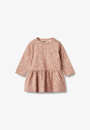 Pikkade käistega pehme roosa kanga kleit lillemustriga. Omab ümmargust kaelust ja kokku volditud seelikut, millel on nööbi detail õlal.