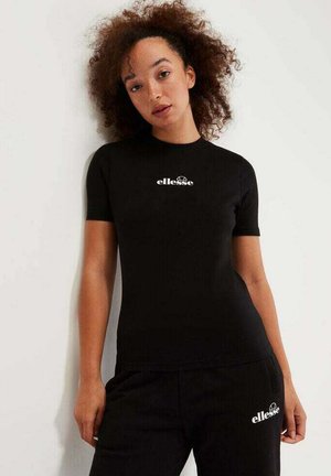 Camiseta negra ajustada de manga corta, con un logo blanco en el pecho. El material parece suave con un leve brillo.