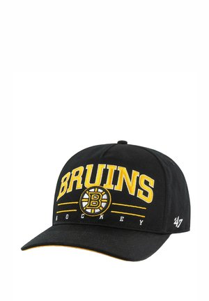 Black baseball cap with "BRUINS" and "HOCKEY" embroidered in yellow. Features a circular Boston Bruins logo on the front.