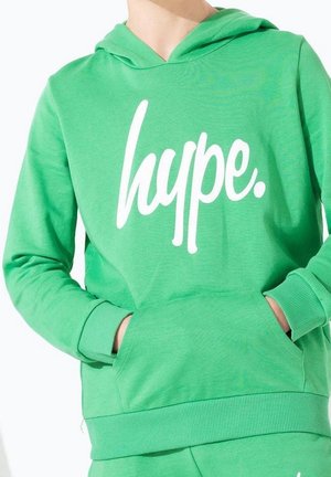 Grøn hættetrøje lavet af bomuldsblandet stof, med en front kangaroo lomme og stort hvidt "hype." grafik på brystet. Ribbet manchetter.