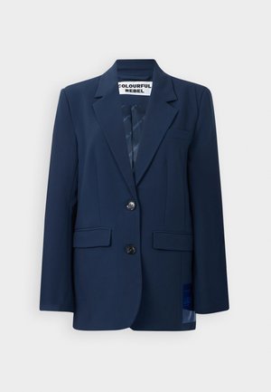 Blazer navy hecho de tela suave, con cierre de dos botones, solapas con muesca, dos bolsillos frontales y un sutil patrón en el forro interior.