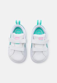 White children's sneakers with turquoise accents, featuring a smooth leather upper, two adjustable Velcro straps, and a rear pull tab.