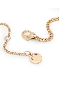 Gold metal chain bracelet featuring a lobster clasp, engraved round charm, and a delicate link design. Smooth texture throughout.