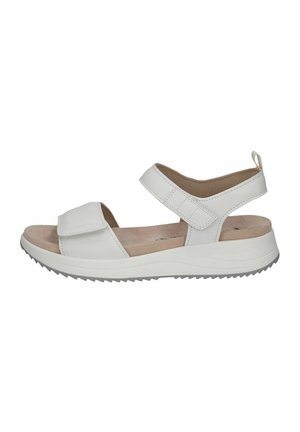 White sandals with two adjustable straps, a cushioned insole, and a textured rubber sole. Features a rounded toe and minimalistic design.