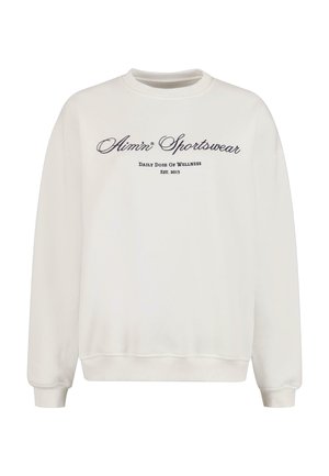 Biely mikina so žebrovanými manžetami a spodným okrajom. Obsahuje vyšívané nápisy "Alimn Sportswear" a "Daily Dose of Wellness" v tmavofialovej farbe. Mäkká textúra.