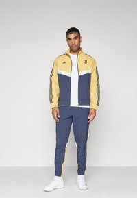 adidas Performance JUVENTUS TURIN SZN TRACK TOP - Klub merchandise - oat