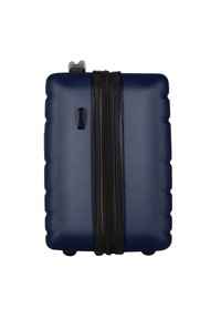 Valigia rigida blu navy con superficie testurizzata, doppi zip e una maniglia resistente. Presenta angoli arrotondati e un design compatto.