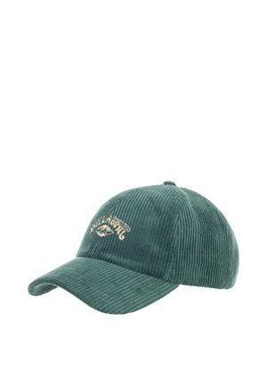 Green corduroy cap with a curved visor, featuring embroidered text in a gold color. Text is arched with a decorative wave design.