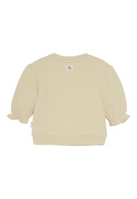 Beżowa koszulka dla niemowląt z długim rękawem, z marszczonymi mankietami, okrągłym dekoltem i metką marki na górnej części pleców.