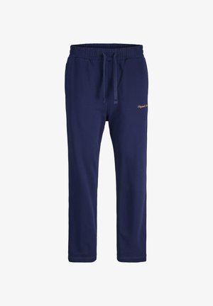Marineblaue Sweatpants aus weichem Material, mit einem elastischen Bund und Kordelzug, sowie einem dezent goldenen gestickten Logo.