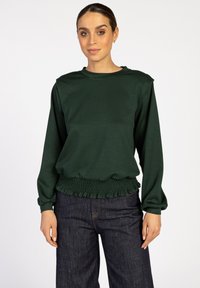 Groene lange mouwen sweatshirt met een gerimpelde rand onderaan, ronde halslijn en een ontspannen pasvorm. Gemaakt van zachte stof met een gladde textuur.