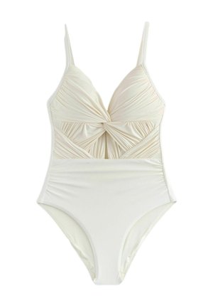 Cream one-piece swimsuit with adjustable straps, ruched bodice, and a knotted detail at the center. Smooth fabric with a matte finish.