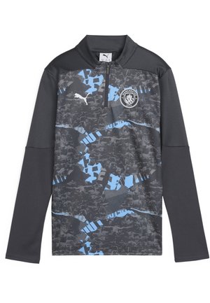 Puma treeningülikond musta värvi sinise abstraktse mustriga. Pikad varrukad, poolsuvav kaelus, vasakul rinnal Manchester City logo.