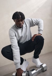 Champion ICONS HEM PANTS - Treniņtērpa apakšdaļas - black