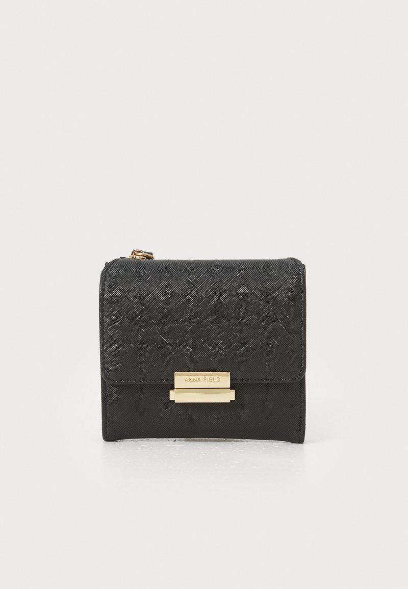 Black textured wallet with gold-tone hardware and a clasp closure, featuring a smooth finish and compact rectangular shape.