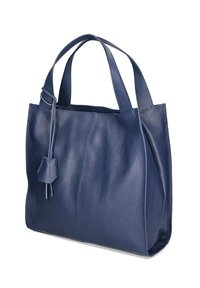 Donkerblauwe leren shopper met een gestructureerde afwerking, dubbele handvatten en een decoratief tassel accent. Heeft gestikte panelen voor stevigheid.