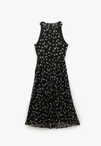 Svart ärmlös klänning med ett blommigt mönster i vitt och grönt. Tillverkad av ett lätt tyg med en flödande pliserad kjol.