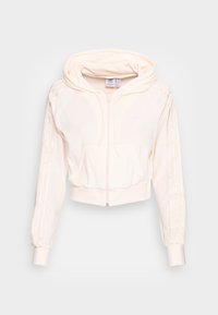 Avklippt, krämfärgad hoodie av mjukt tyg med dragkedja framtill, två framfickor och ribbade muddar. Vita ränder längs ärmarna.