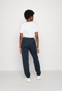 Lindex TROUSERS AVA PUNTO WITH CUFF - Calças de fato de treino - dark navy