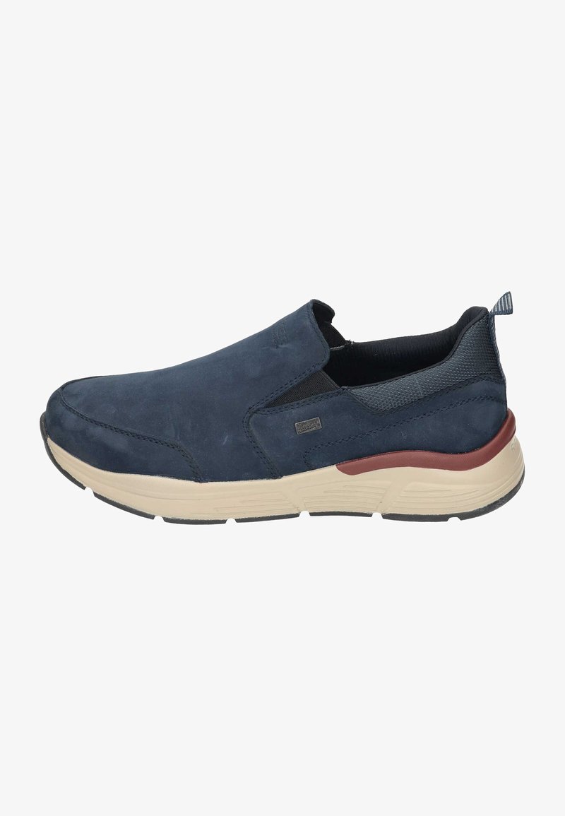 Blue slip-on shoe made of suede and mesh, featuring a rubber sole with beige accents and a small pull tab at the heel.