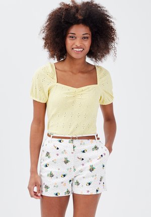 T-shirt print - jaune pastel