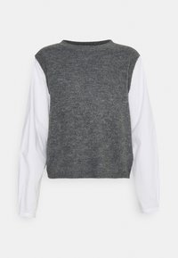 Grijze gebreide trui met een ronde hals, voorzien van lange witte mouwen en een cropped ontwerp. Zachte textuur met contrasterende kleuren.