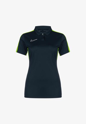Navy polo shirt with lime green accents, made of smooth fabric. Features a collar, three buttons, and a white Nike logo on the chest.